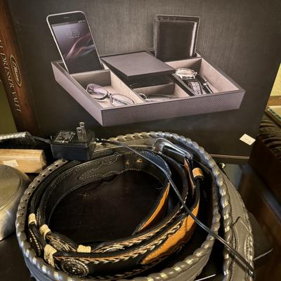 Men’s valet stand, belts and light.