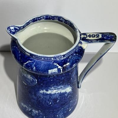 ROWLAND MARSELLUS HISTORICAL POTTERY PITCHER IN BLUE & WHITE WITH VIGNETTES OF VARIOUS HISTORICAL SCENES INCL WILLIAM PENNS TREATY,...