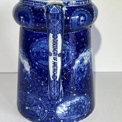 ROWLAND MARSELLUS HISTORICAL POTTERY PITCHER IN BLUE & WHITE WITH VIGNETTES OF VARIOUS HISTORICAL SCENES INCL WILLIAM PENNS TREATY,...