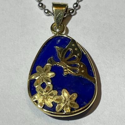 VINTAGE Dainty 14K Yellow Gold Lapis Pendant on a 16" Fashion White Metal Necklace in Very Good Preowned Condition as Pictured.