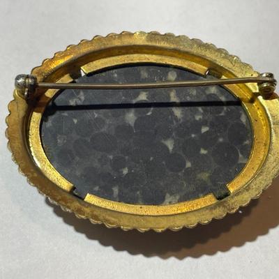 Vintage/Antique Gold-tone Onyx Style Pin/Brooch Preowned from an Estate in Good Preowned Condition.