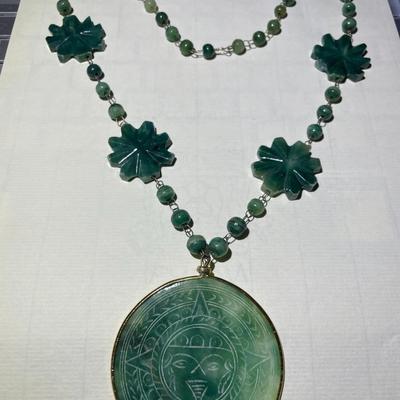 Vintage Etched Mexican Green Onyx Stone Necklace 26" Long w/Aztec Sun God Pendant in Good Preowned Condition.