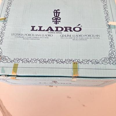 Lladro Girl #1469 Riding carousel Horse *flower missing off the very top.