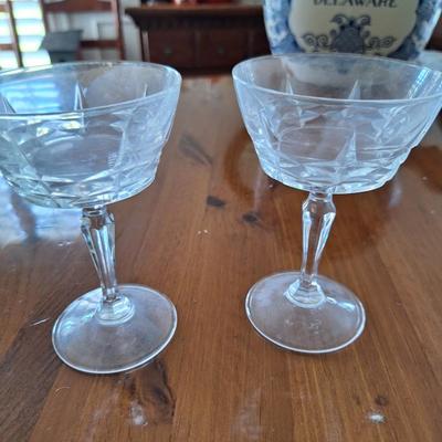 2 EAPG toasting champagne glasses