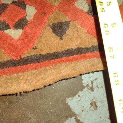 Area Rug. Approx 67" x 47".