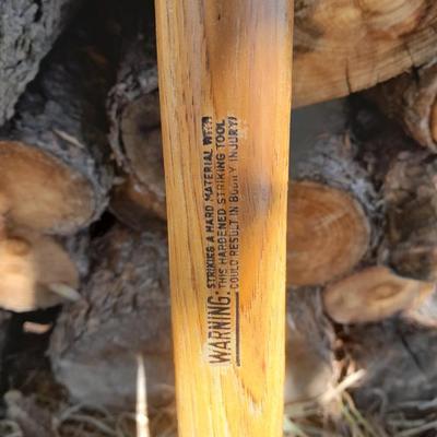 Lots of Firewood with a nice double-sided Axe to split it with and a fireplace tool set