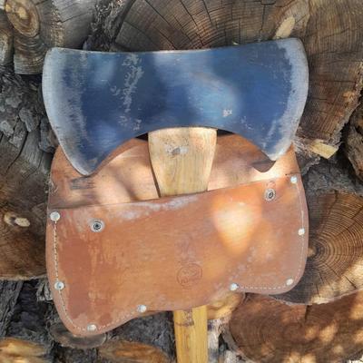 Lots of Firewood with a nice double-sided Axe to split it with and a fireplace tool set