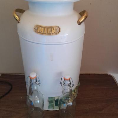 Decorative / planter Metal milk can with glass storage bottles