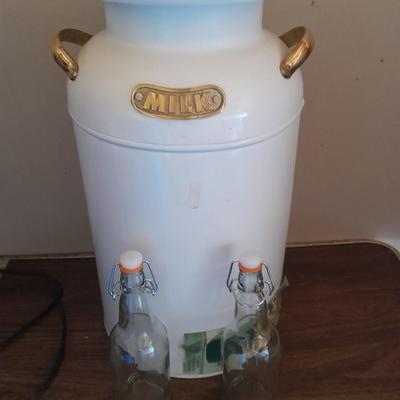 Decorative / planter Metal milk can with glass storage bottles