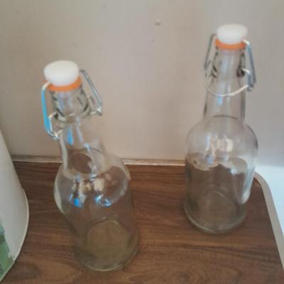 Decorative / planter Metal milk can with glass storage bottles