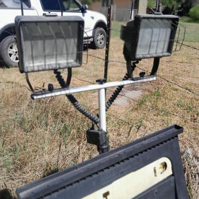 Double headed Tripod work light with storehorse folding sawhorse