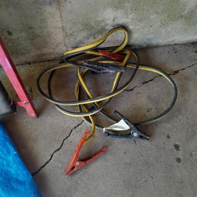Car Creeper - Jumper cables and a used blue tarp