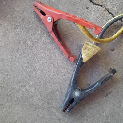 Car Creeper - Jumper cables and a used blue tarp