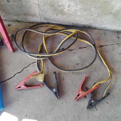 Car Creeper - Jumper cables and a used blue tarp
