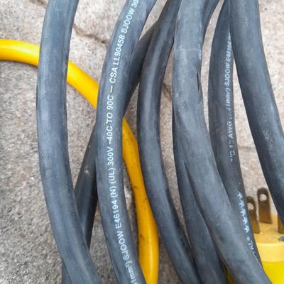 Work light with extension cord and Surge protector power bar