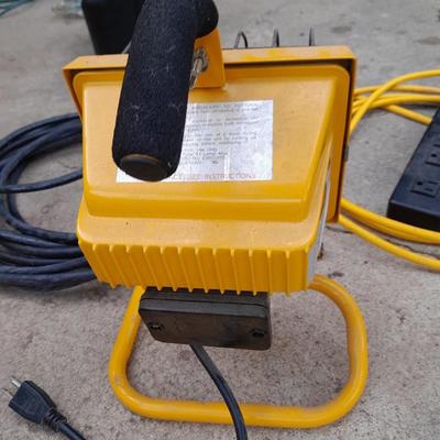 Work light with extension cord and Surge protector power bar