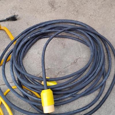 Work light with extension cord and Surge protector power bar