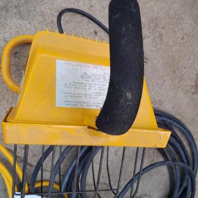 Work light with extension cord and Surge protector power bar