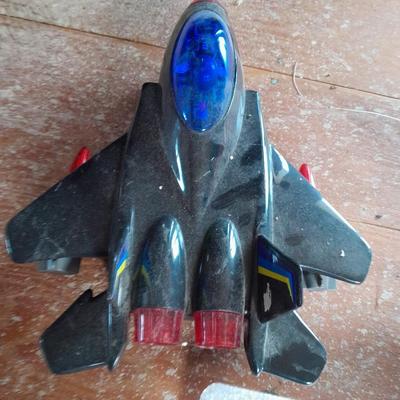 Two toy airplanes - MGA Entertainment - and Vintage roaring Tom cat Tom jet