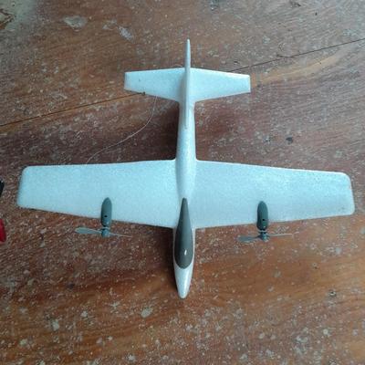 Two toy airplanes - MGA Entertainment - and Vintage roaring Tom cat Tom jet