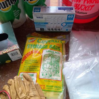 Home Depot bucket with cleaning supplies - Disposable Coveralls - Trash bags - light - Dawn and more