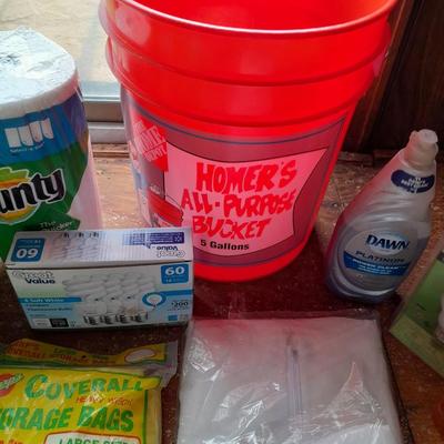 Home Depot bucket with cleaning supplies - Disposable Coveralls - Trash bags - light - Dawn and more