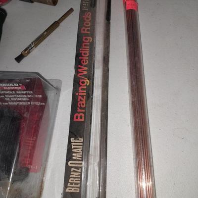 Welding needs -- Nice leather gloves new - welding wire - welding tips and more !
