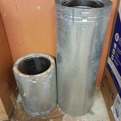 Two pieces of metal fab chimney