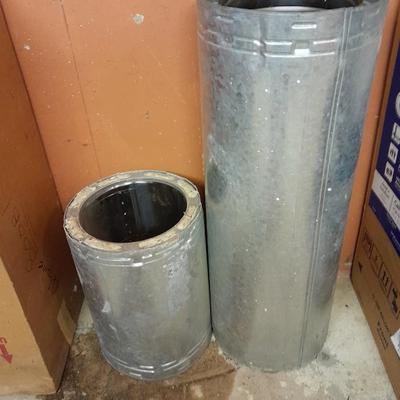 Two pieces of metal fab chimney