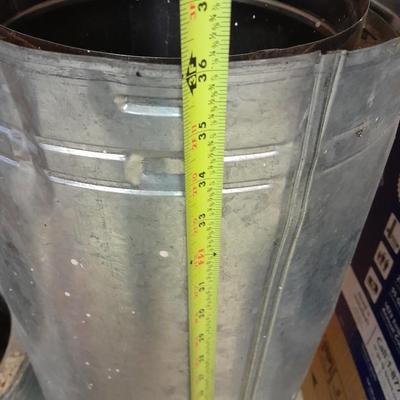 Two pieces of metal fab chimney