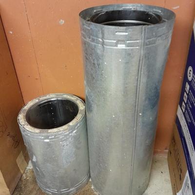 Two pieces of metal fab chimney