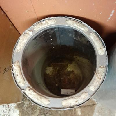 Two pieces of metal fab chimney