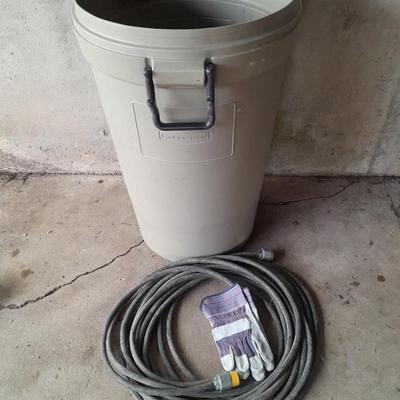 Large Rubbermaid trash can - large extension cord - work gloves