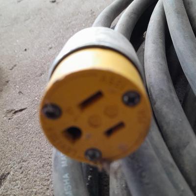 Large Rubbermaid trash can - large extension cord - work gloves