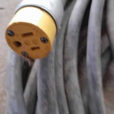 Large Rubbermaid trash can - large extension cord - work gloves