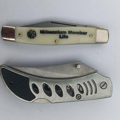 Two Pocket knives - Lakota with advertisement