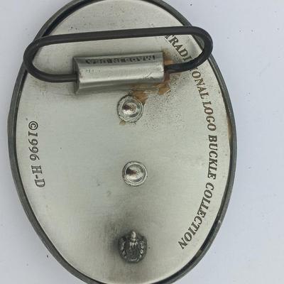 Harley Davidson Belt Buckle and a 2000 Sturgis pin