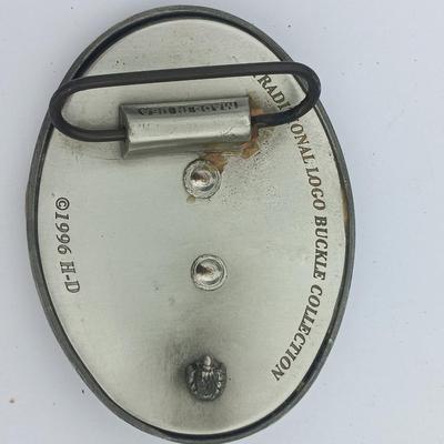 Harley Davidson Belt Buckle and a 2000 Sturgis pin
