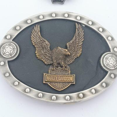 Harley Davidson Belt Buckle and a 2000 Sturgis pin