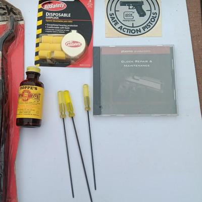 Old new stock Window mount gun rack and a Ballistic shooting bag with gun cleaning items
