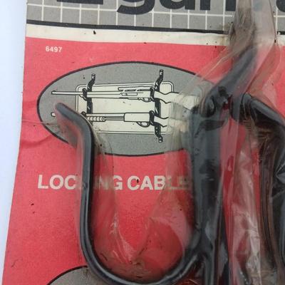 Old new stock Window mount gun rack and a Ballistic shooting bag with gun cleaning items