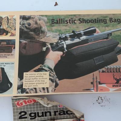 Old new stock Window mount gun rack and a Ballistic shooting bag with gun cleaning items
