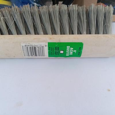 Assortment of household goods - bottles of butane - spray foam - a brush assortment and more