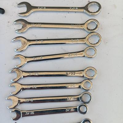 Assortment of little handheld tools - small wrenches - screwdrivers and an Allen wrench set