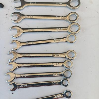 Assortment of little handheld tools - small wrenches - screwdrivers and an Allen wrench set