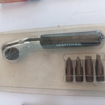 Assortment of little handheld tools - small wrenches - screwdrivers and an Allen wrench set