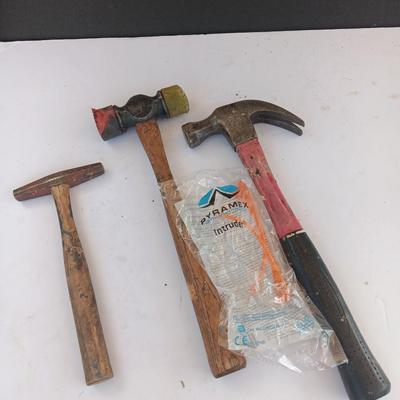 Three hammers and a pair of new safety glasses