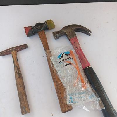 Three hammers and a pair of new safety glasses