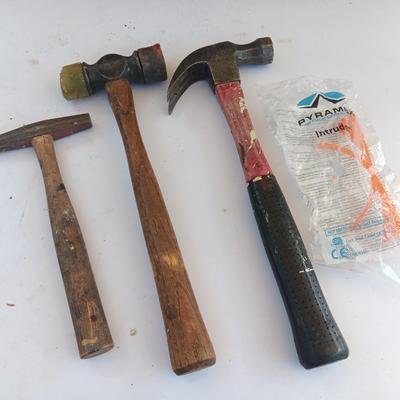 Three hammers and a pair of new safety glasses