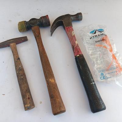 Three hammers and a pair of new safety glasses